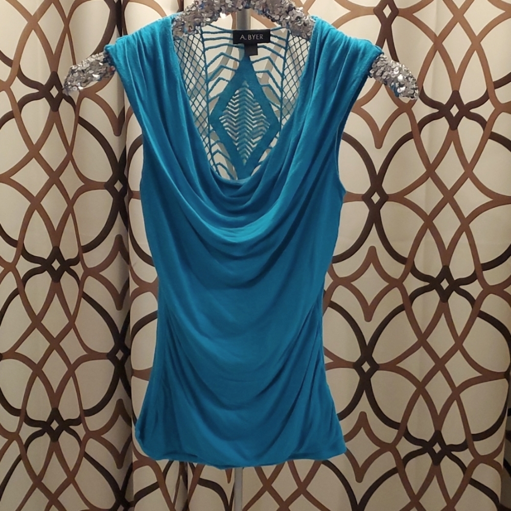 A. BYER* Light blue swoop neck and lace back embellishment top.